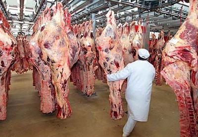 Beef carcasses at a wholesale meat market in Paris