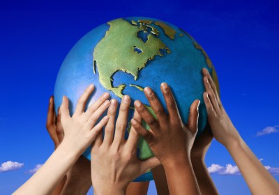 Hands on a globe