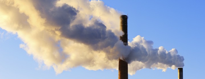 Exhaust fumes blown into a sky.